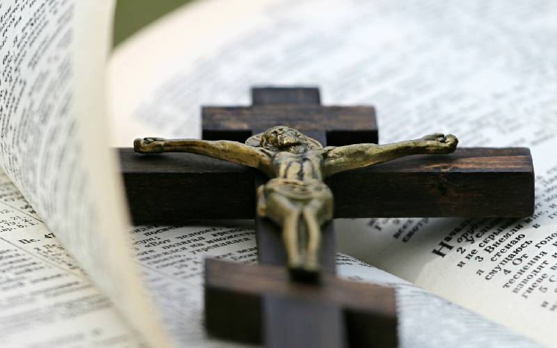 A cross with the crucifix on top of it.